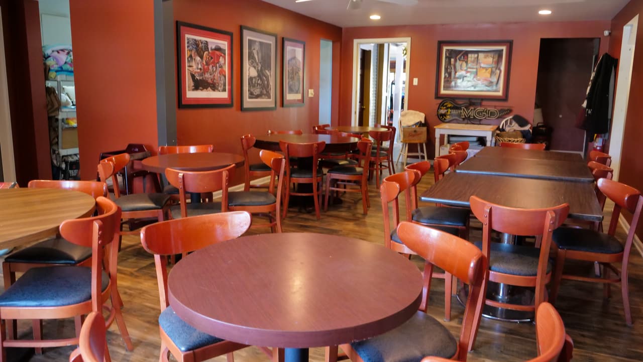 Orange dining room set with round tables