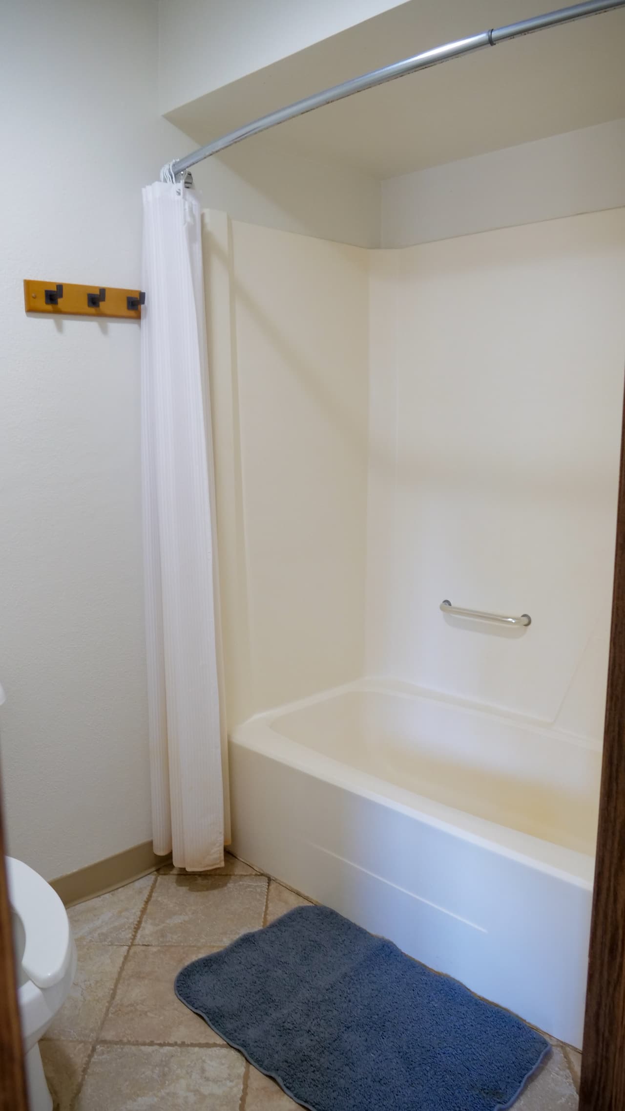 Guest room bathroom with tub and shower
