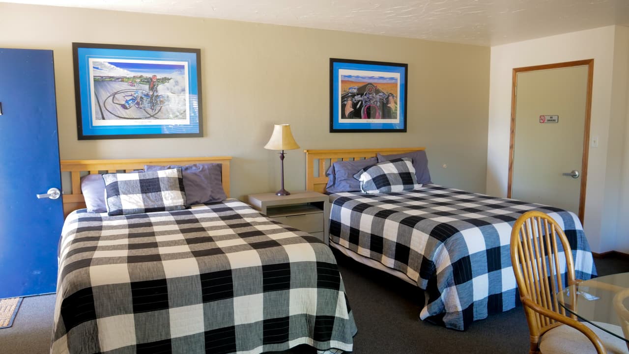 Two queen beds in a guest room