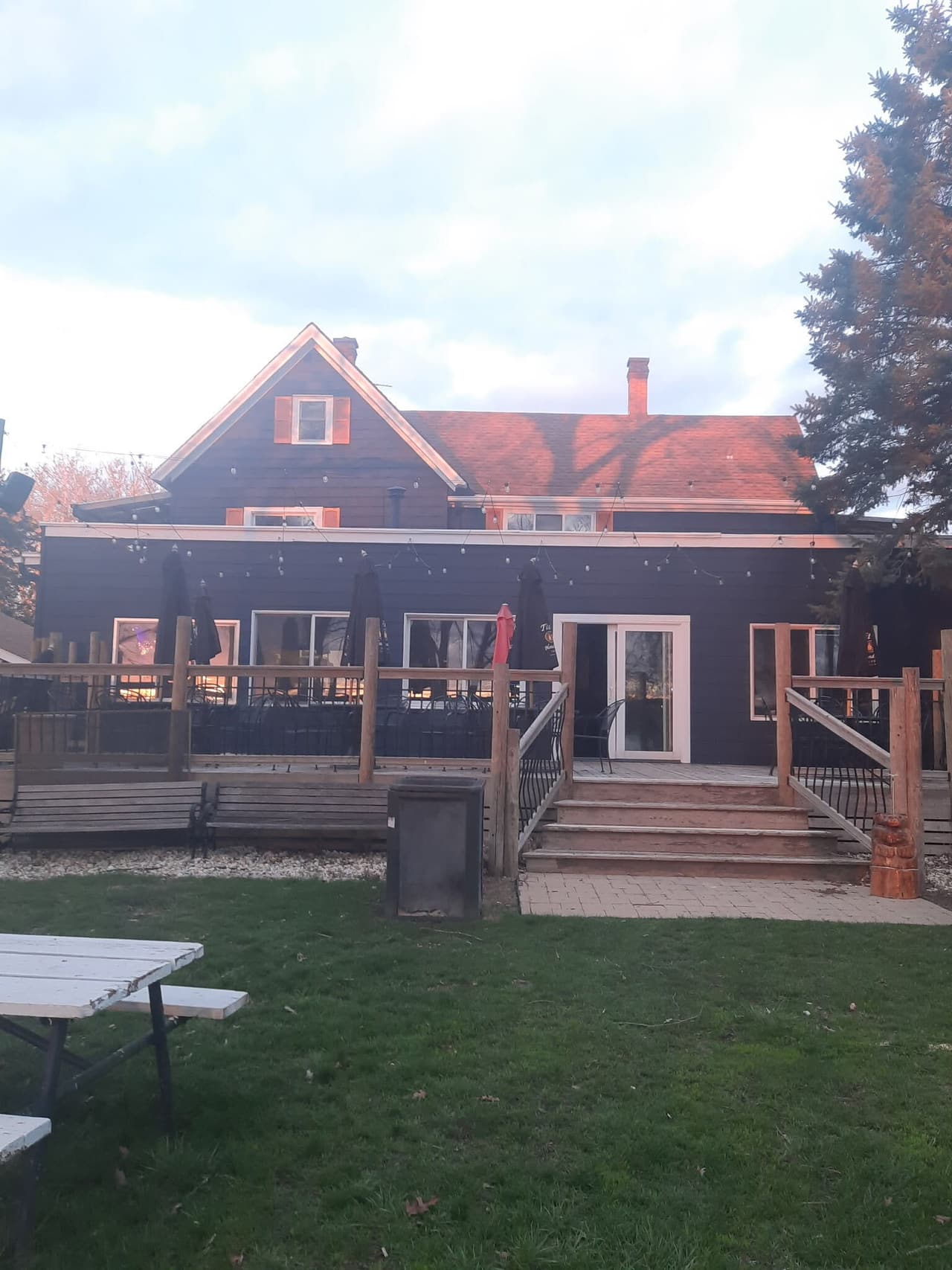 The main building and deck at dusk