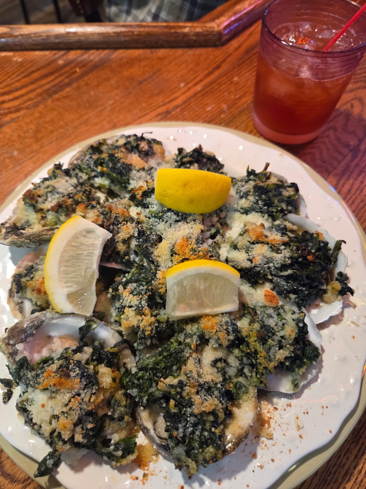 Baked oysters with spinach and lemon