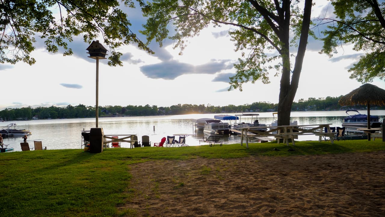 Lawn path down to the beach and piers on Lily Lake